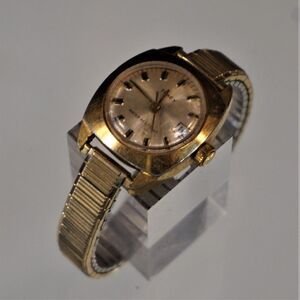 Vintage Timex Date Watch Gold Tone Stretch Band Manual Wind Women